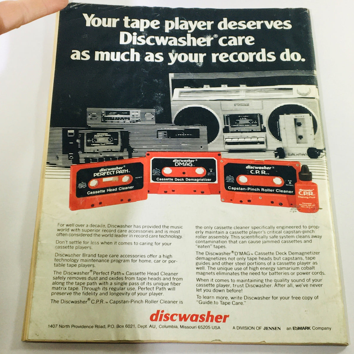 Back cover of Audio Magazine May 1984, displaying Discwasher tape care products including the Perfect Path head cleaner and other cassette maintenance tools.
