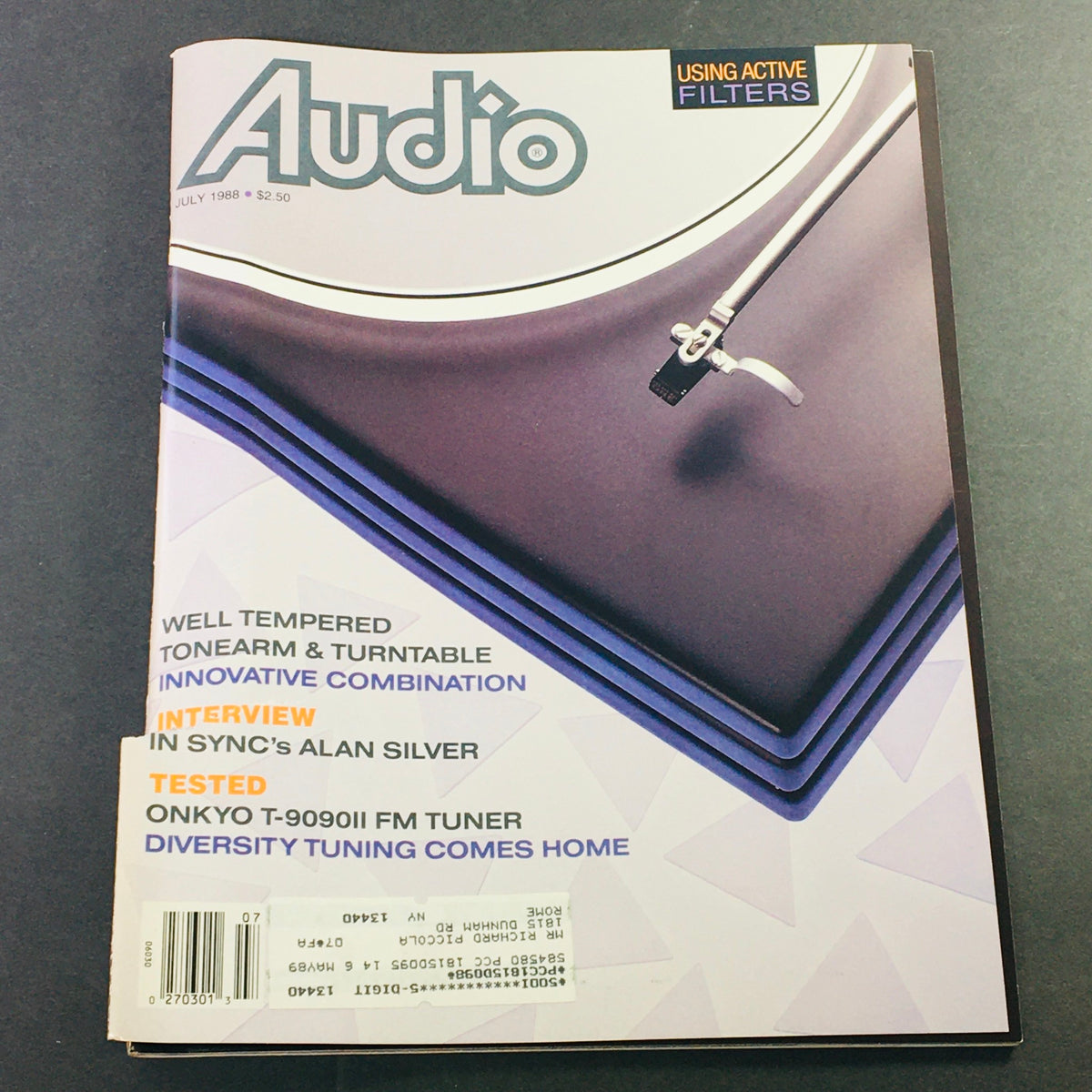 Vintage Audio Magazine July 1988 cover featuring an exclusive interview with Alan Silver and a review of the Onkyo T-9090II FM tuner. The design showcases vibrant typography and an illustration of audio equipment.