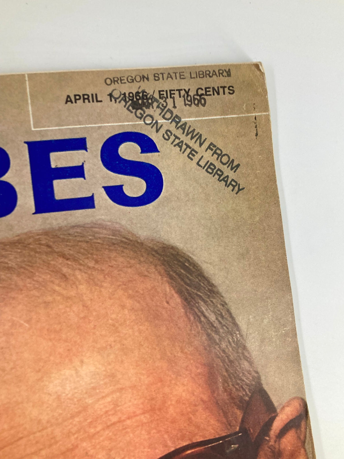 Close-up of the upper part of VTG Forbes Magazine April 1 1966, showing the magazine title and a library withdrawal stamp from Oregon State Library.