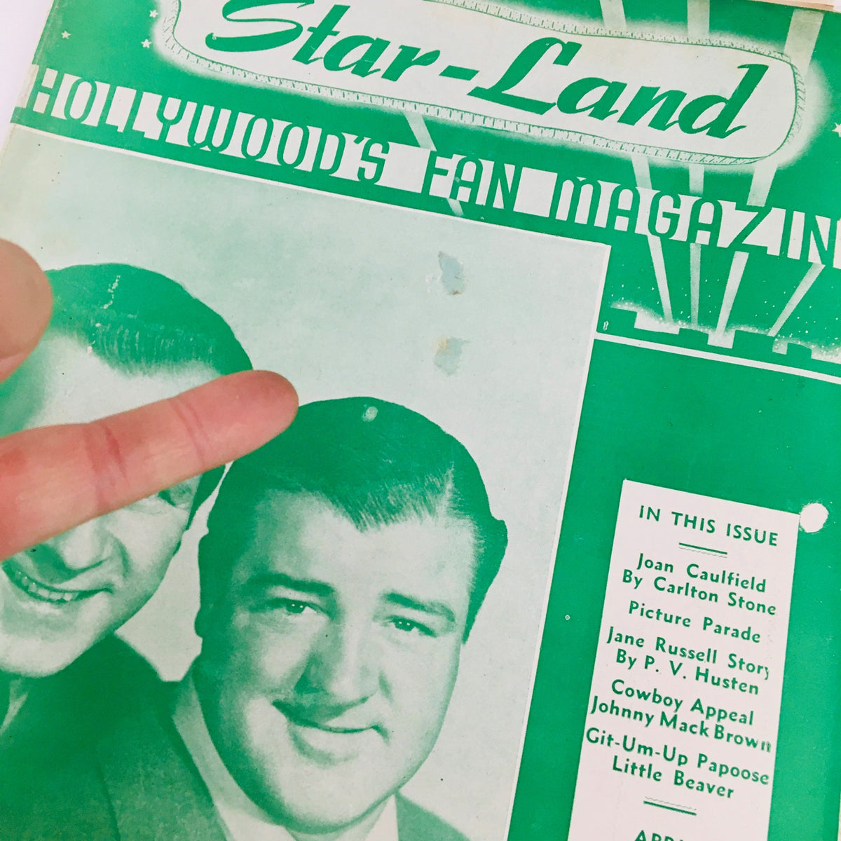 Close-up image of Star-Land Hollywood's Fan Magazine April 1946, highlighting the Jane Russell Story and a finger pointing at a prominent detail on the vintage cover.
