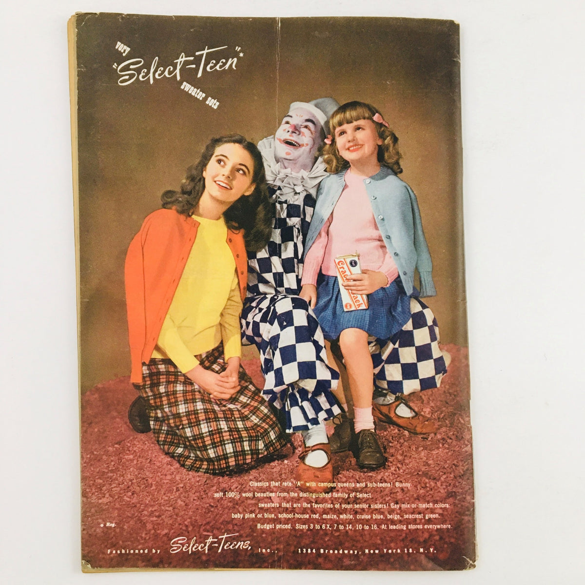 Cover of Select-Teen Magazine, showcasing two girls and a clown, representing youth culture and fashion from the 1940s.