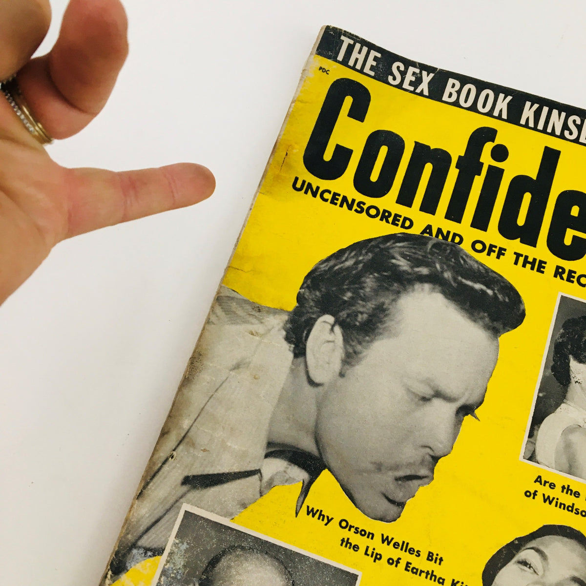 Close-up of the Confidential Magazine March 1954 cover highlighting Orson Welles and Eartha Kitt, showcasing the iconic design.