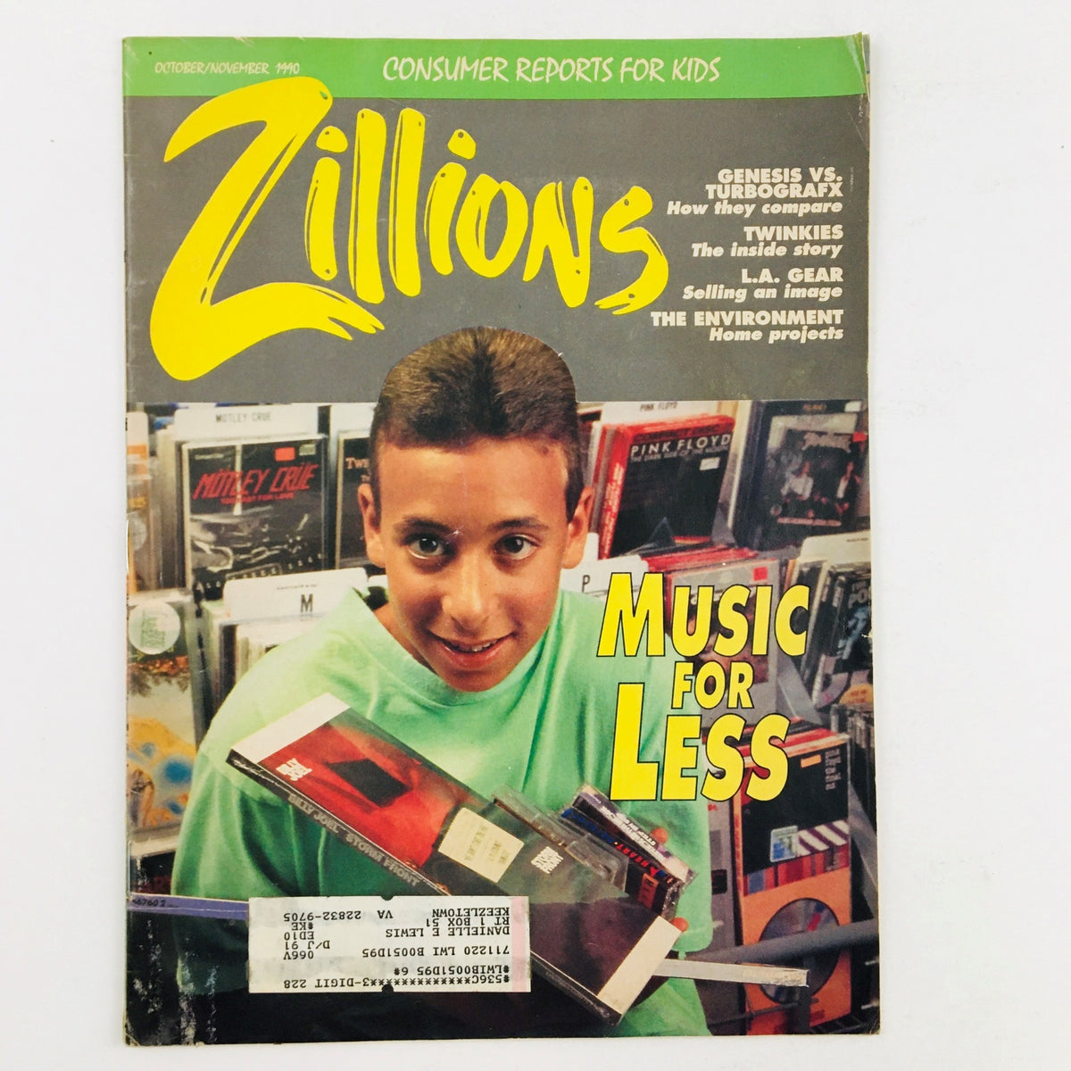 Cover of Zillions Magazine October November 1990 featuring a young boy with a bright green shirt, smiling and holding music CDs in a store, highlighting the comparison of Genesis vs Turbografx gaming consoles.