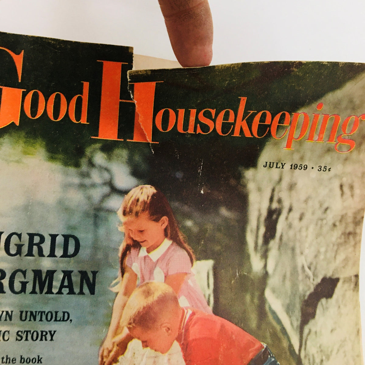Close-up view of the cover of July 1959 Good Housekeeping Magazine highlighting Ingrid Bergman's story, alongside two children playing.