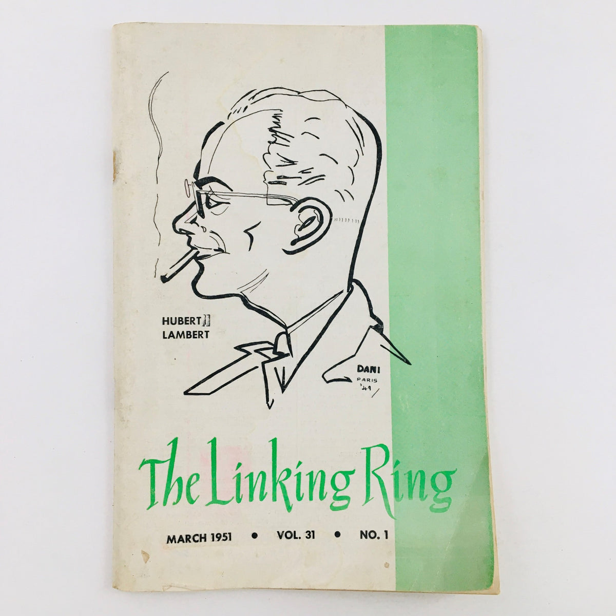 Cover of The Linking Ring Vol. 31 No. 1 March 1951 featuring a caricature of Hubert Lambert smoking a cigarette with text indicating the magazine's title and issue details.