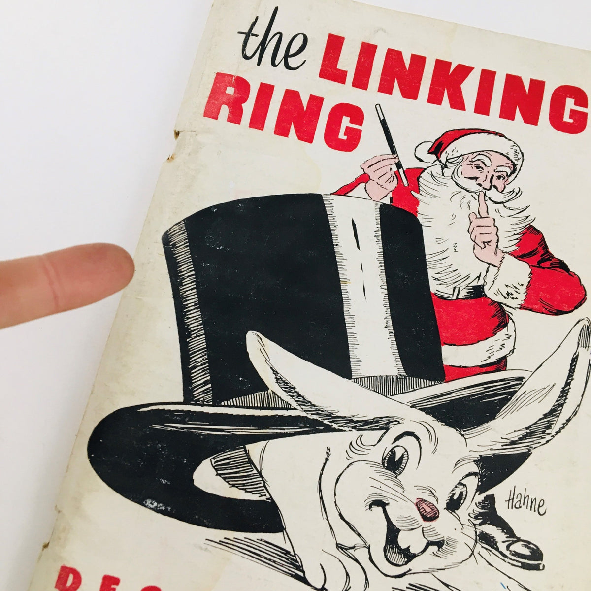 Detailed view of the cover of The Linking Ring Vol. 31 No. 10 December 1951 highlighting Santa Claus and a rabbit.
