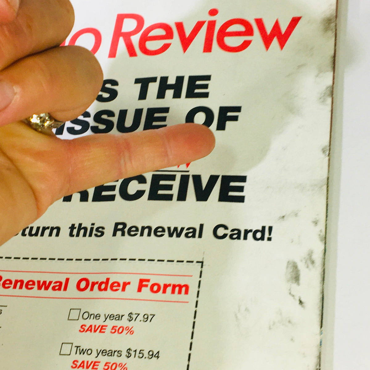Close-up shot of the back cover of the Stereo Review Magazine October 1994, emphasizing 'This is the last issue of Stereo Review you'll receive' with a finger pointing to the text.