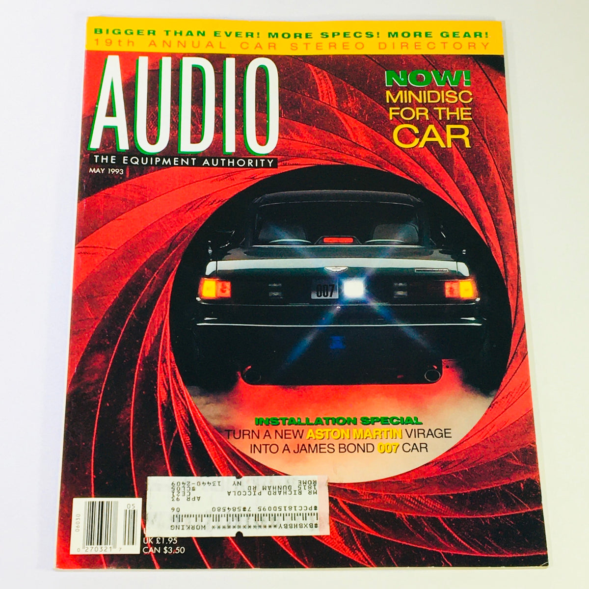 Audio May 1993 magazine featuring the 19th Annual Car Stereo Directory and advancements in minidisc technology for cars. The cover displays an Aston Martin car with a '007' license plate, highlighting a special on turning a new Aston Martin into a James Bond car.