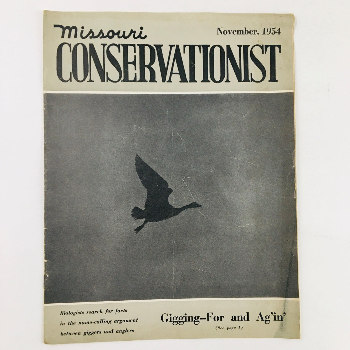 Cover of VTG Missouri Conservationist Magazine November 1954 featuring a silhouette of a goose in flight with the title and month prominently displayed.
