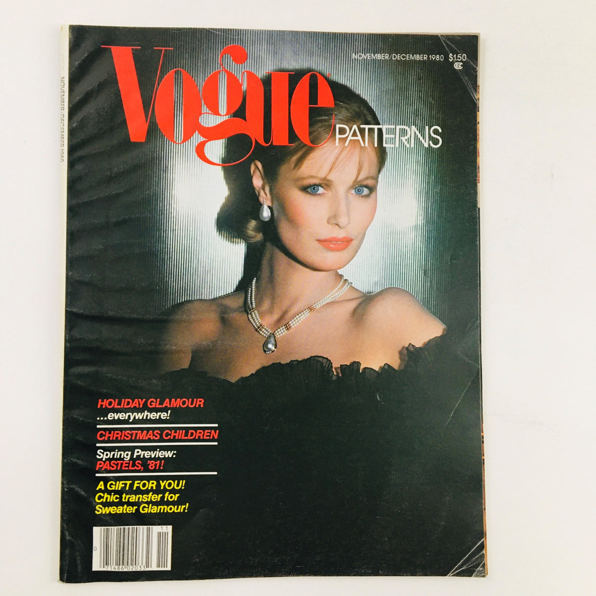 Cover of Vogue Patterns Magazine November 1980 showcasing Ninna Ricci Paneled Perfection design, featuring a model with elegant jewelry and glamorous hairstyle.