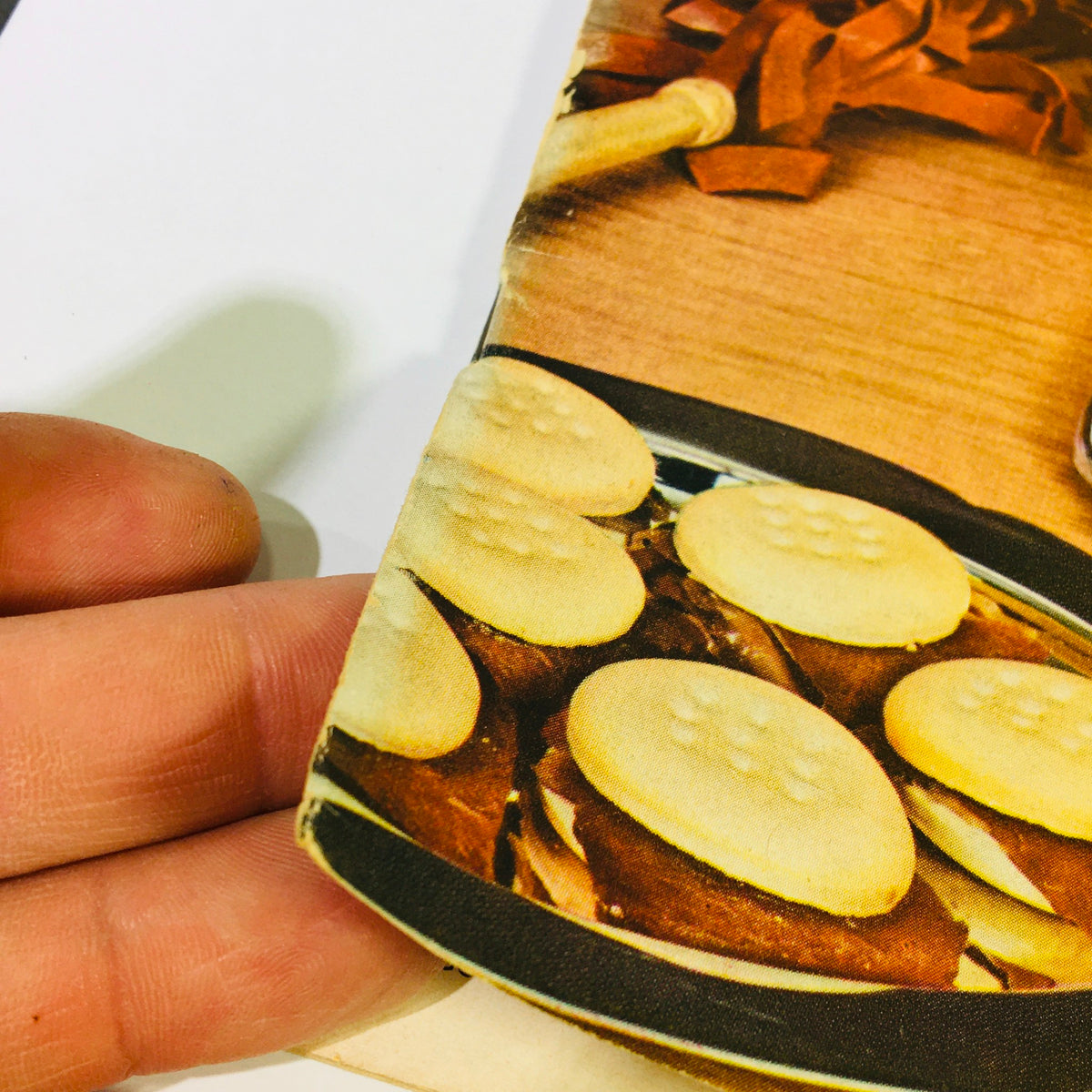 Close-up of VTG Gourmet The Magazine of Good Living May 1958 showcasing delicious dessert cookies on a serving tray.