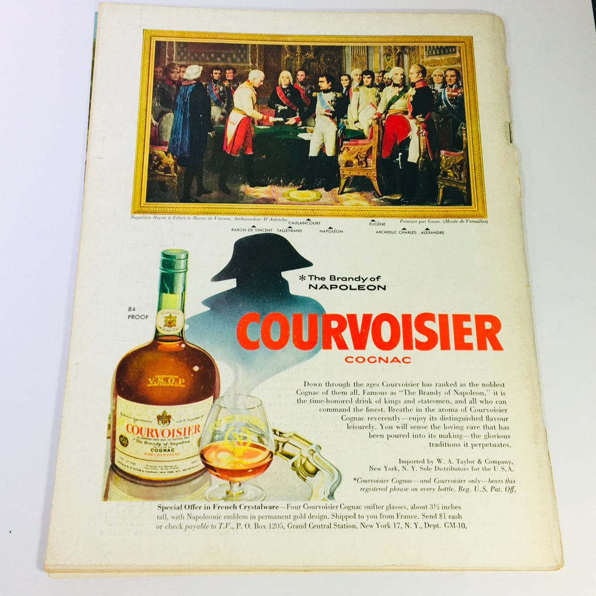 Cover page of VTG Gourmet The Magazine of Good Living May 1958 featuring an advertisement for Courvoisier Cognac, showcasing a historical scene with Napoleon, a bottle of Courvoisier, and an elegant glass.