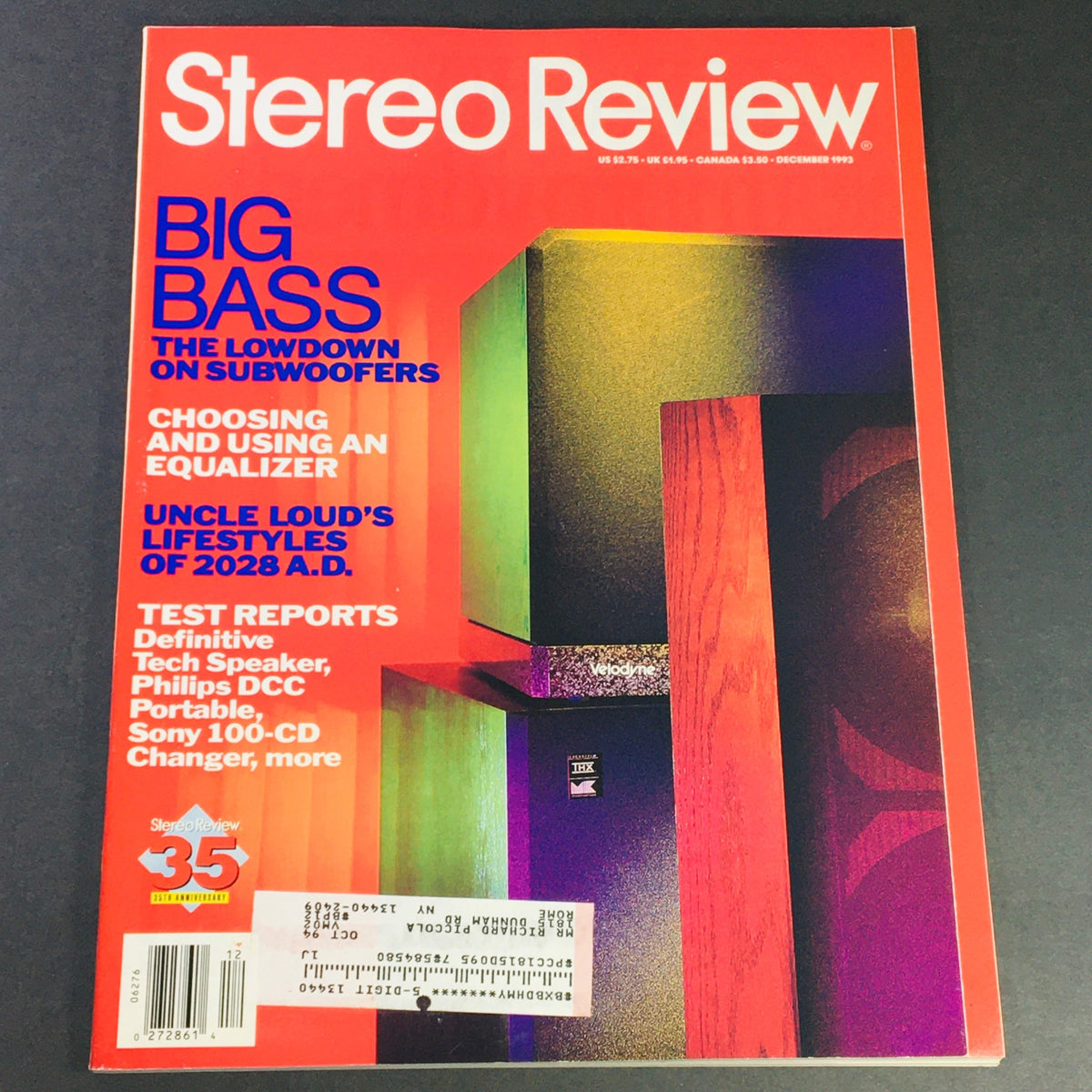 Cover of Stereo Review Magazine December 1993 featuring the title 'Stereo Review,' with bold headlines on audio topics like 'BIG BASS,' and articles on Definitive Tech Speaker and Philips DDC. The design showcases vibrant graphics with colorful elements and a price tag, perfect for vintage magazine collectors.