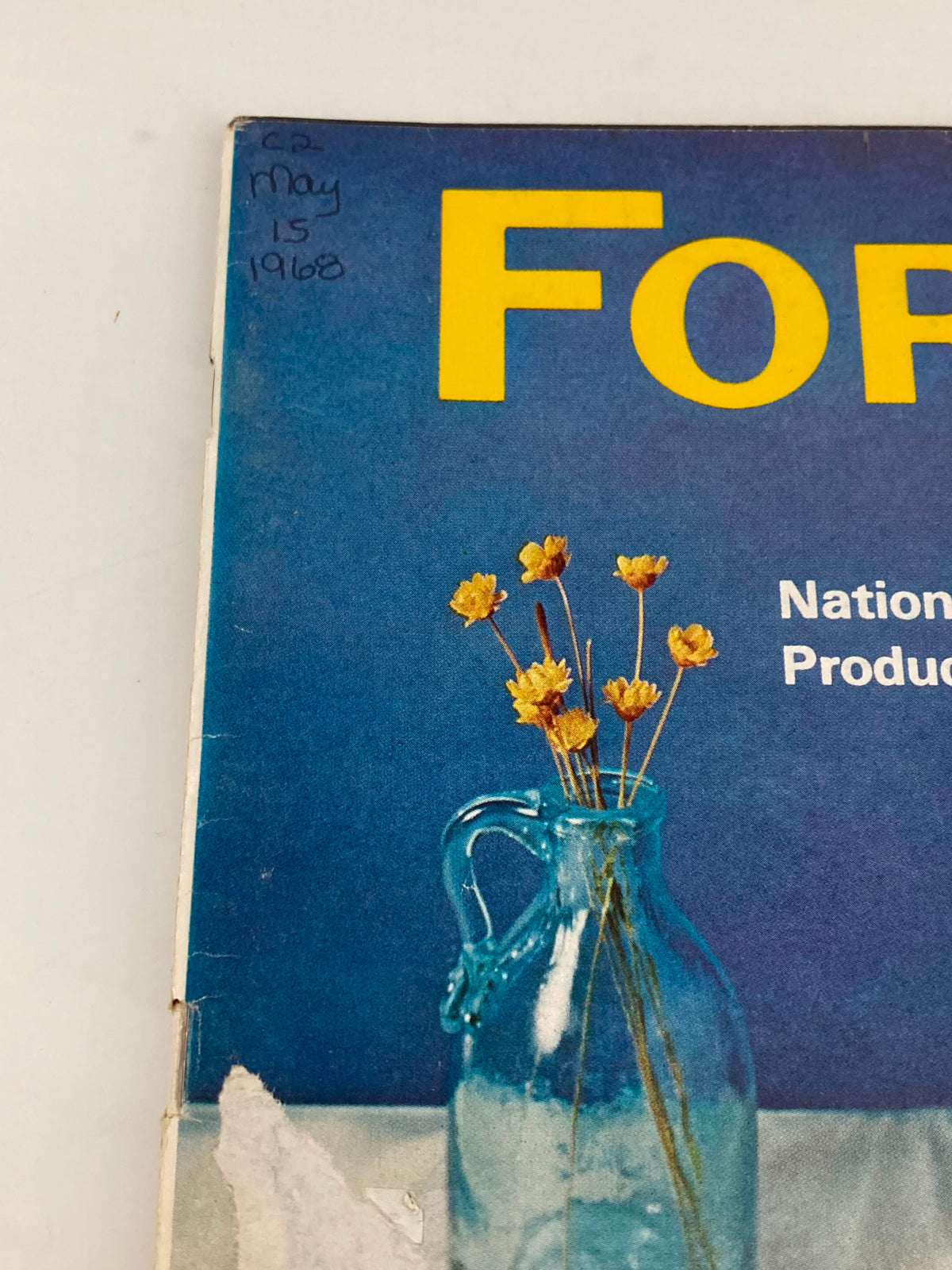 Close-up of the cover of Forbes Magazine from May 15, 1968, displaying the title and National Dairy Products Corp details, along with decorative flowers.