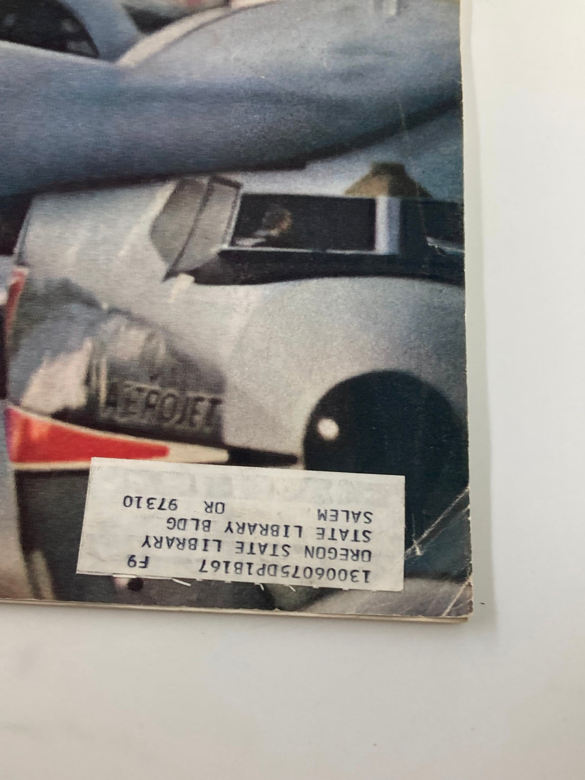 Close-up view of the bottom corner of the VTG Forbes Magazine October 1, 1968, displaying library sale tags and a vintage aesthetic.
