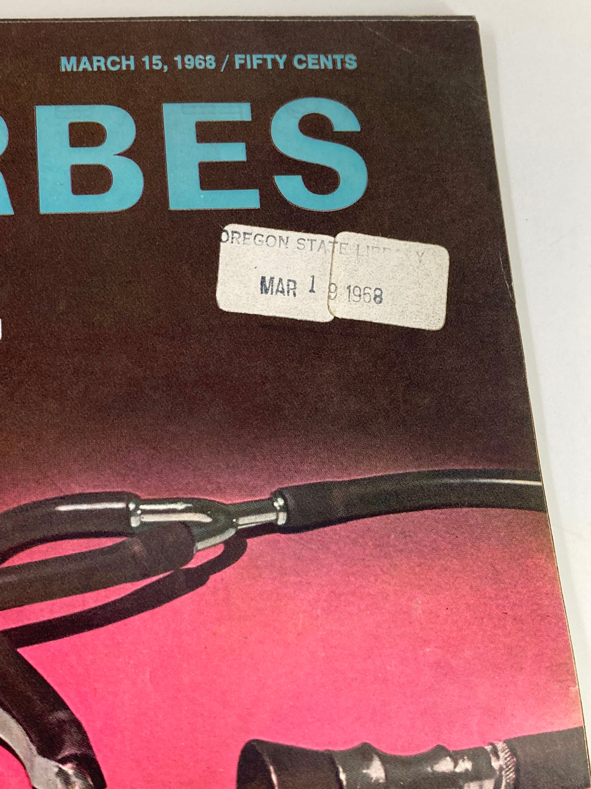 Close-up view of the cover of VTG Forbes Magazine March 15 1968 showing publication details and a stethoscope against a pink background.