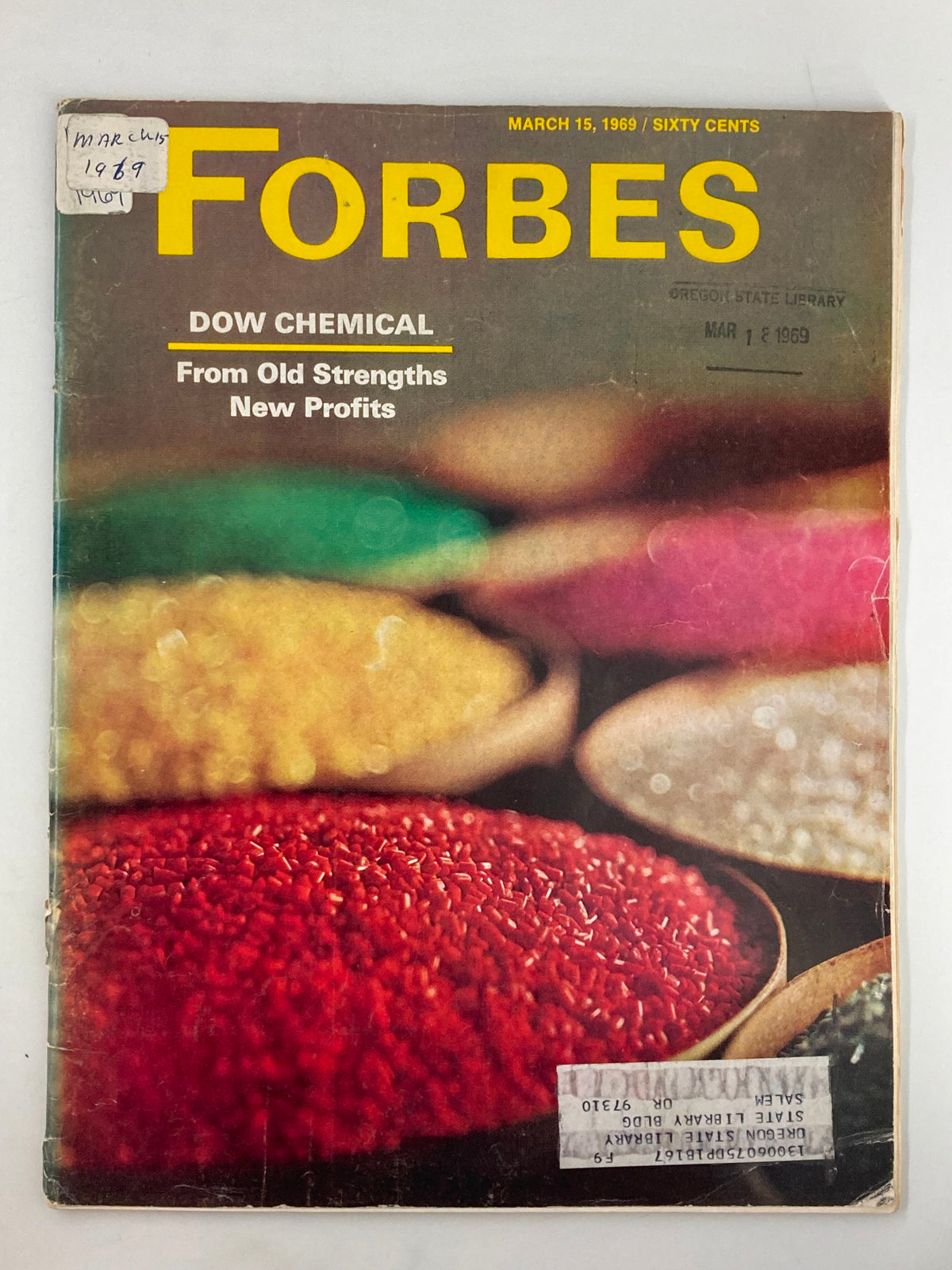 Vintage Forbes Magazine March 15 1969 featuring Dow Chemical cover story titled 'From Old Strengths, New Profits'. The magazine includes visible wear and a library stamp, highlighting its collectible nature.