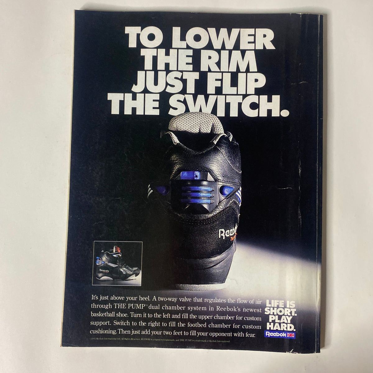 Back cover of IronMan Magazine January 1992 Vol. 51 No. 1 featuring an advertisement for Reebok shoes, showcasing innovative basketball footwear with a focus on customizable cushioning and support.