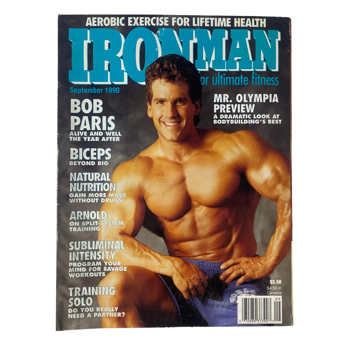Cover of IronMan Magazine September 1990 Vol 49 No. 9 featuring Bob Paris, showcasing his physique and promoting fitness with headlines on aerobic exercise, Mr. Olympia preview, and bodybuilding tips.