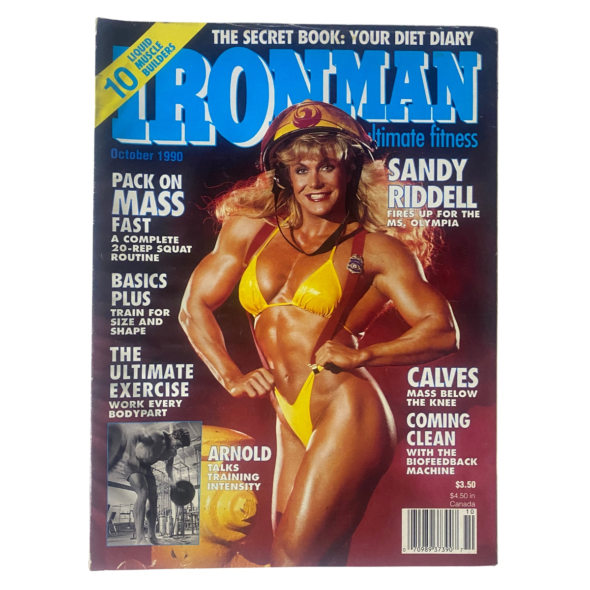 IronMan Magazine October 1990 Vol 49 No. 10 featuring Sandy Riddell on the cover in a yellow bikini, showcasing fitness culture from 1990. The magazine highlights bodybuilding strategies, training tips, and nutritional insights.