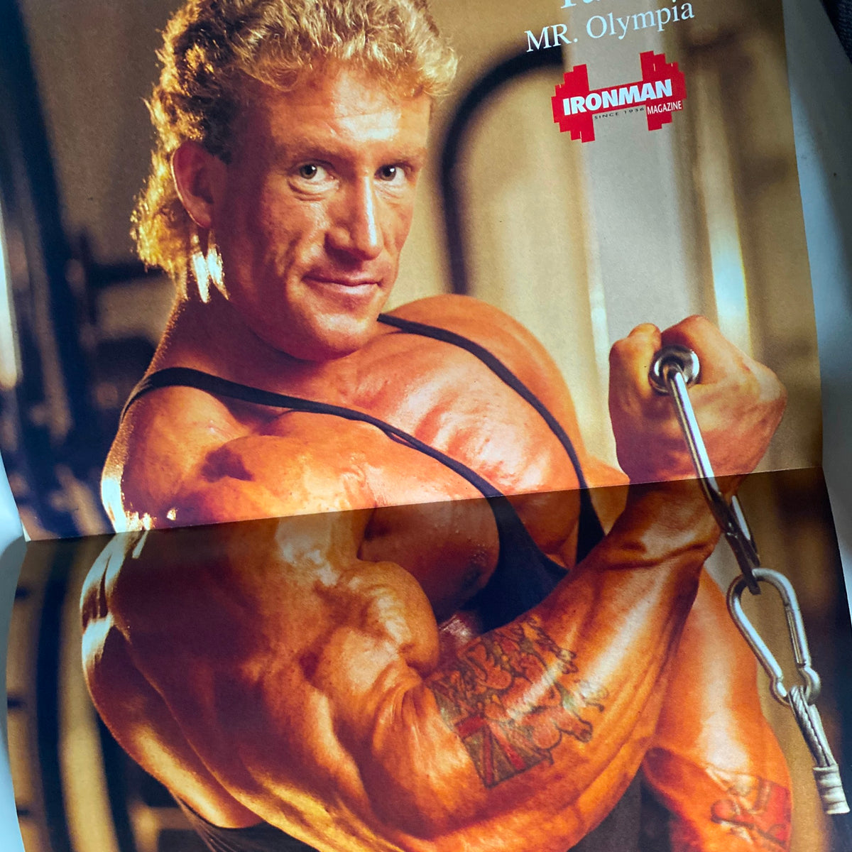 Fold-out poster of Dorian Yates from IronMan Magazine January 1995 Vol 54 No 1, highlighting his physique and contributing to bodybuilding culture.