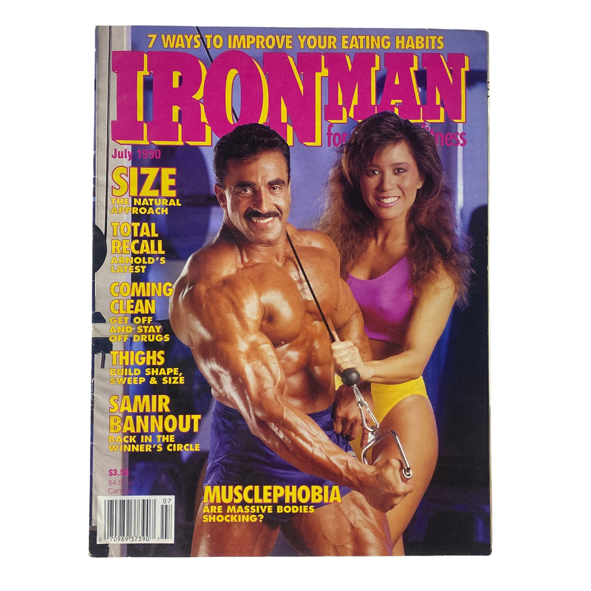 IronMan Magazine July 1990 Vol 49 No 7 featuring cover models Samir Bannout and Kiana Tom, showcasing bodybuilding strength and fitness insights, ideal for vintage magazine collectors.