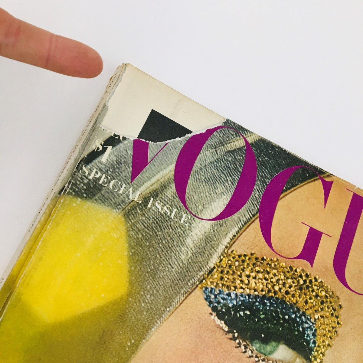 VTG Vogue Magazine December 1964 Wonders for the Christmas Eyes - Close-up of magazine cover showing wear and unique decorative elements.