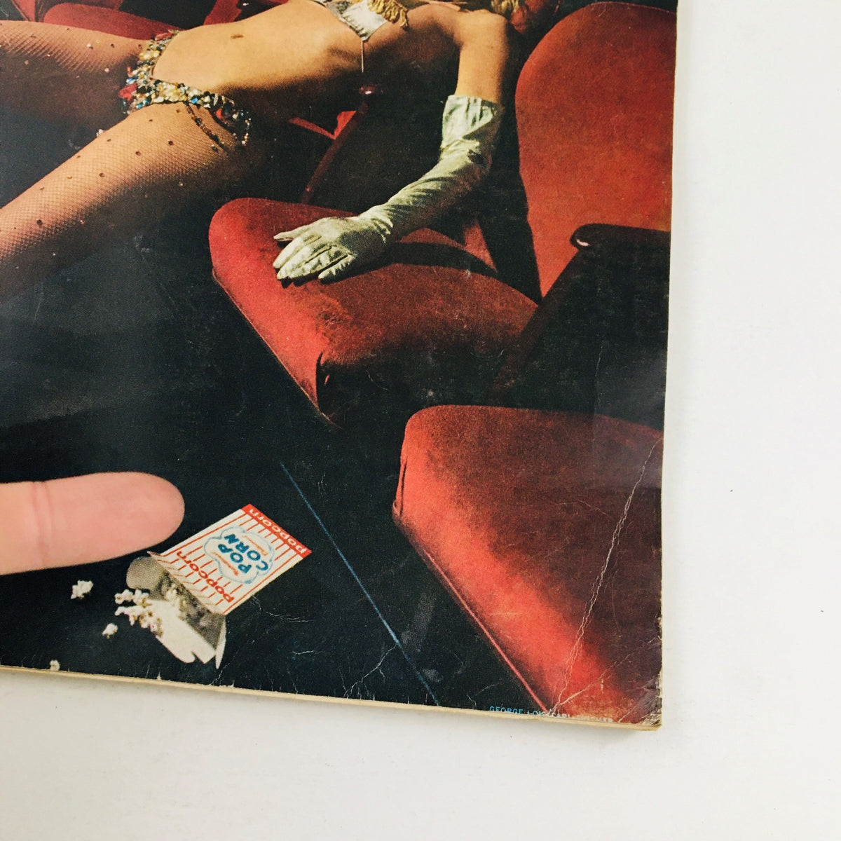 Cover of VTG Esquire Magazine August 1969, showcasing a woman in glamorous attire seated on red chairs, symbolizing the vintage era and topics on public decency.