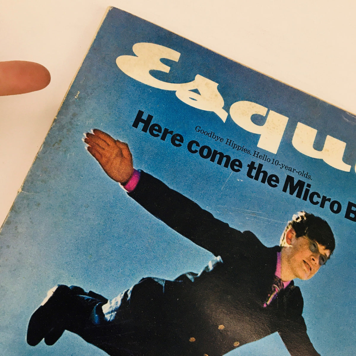 Close-up view of the VTG Esquire Magazine March 1968 cover, highlighting the title 'Here Come The Micro Boppers' and graphics with a child flying.