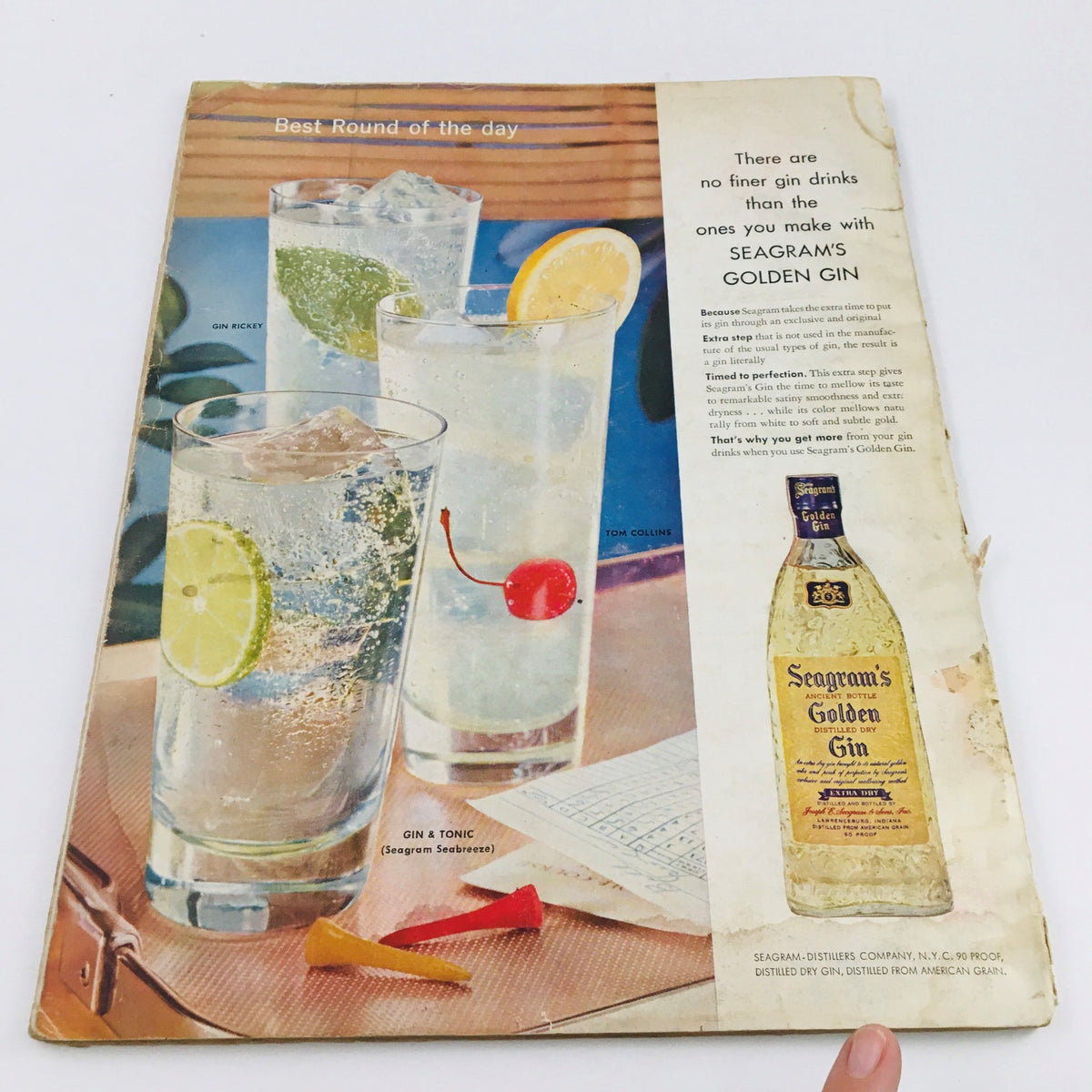 VTG Esquire Magazine July 1956 featuring an advertisement for Seagram's Golden Gin, showcasing refreshing gin cocktails with ingredients like lime, cherry, and tonic water.