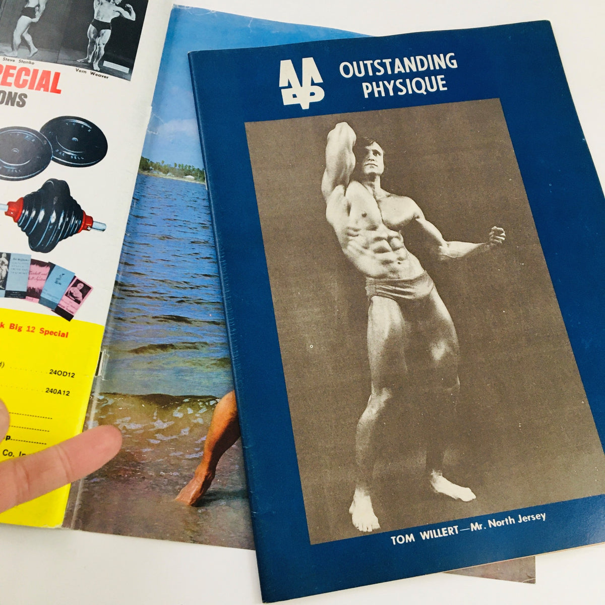 Muscular Development Magazine August 1974 featuring the Outstanding Physique cover with Tom Wilert, showcasing bodybuilding culture of the 1970s.