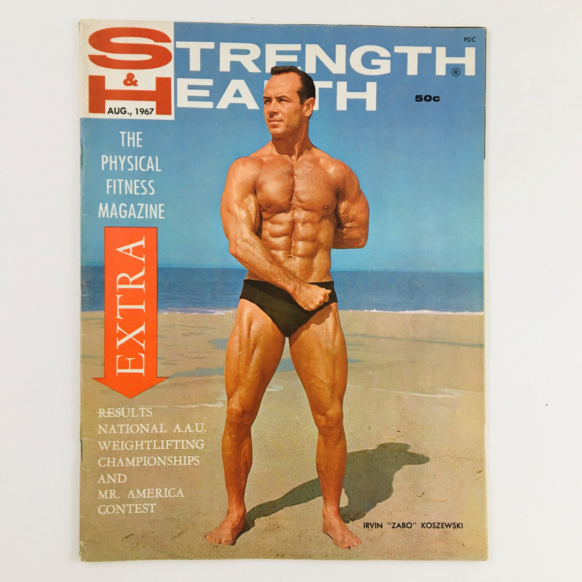 Cover of Strength & Health Magazine August 1967 featuring Irvin 'Zabo' Koszewski, showcasing the physical fitness theme with a beach backdrop.