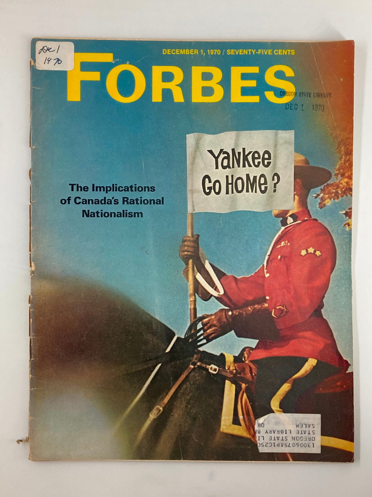 Forbes Magazine December 1, 1970 cover featuring the title 'The Implications of Canada's Rational Nationalism' with a mounted police officer holding a sign that reads 'Yankee Go Home?'.