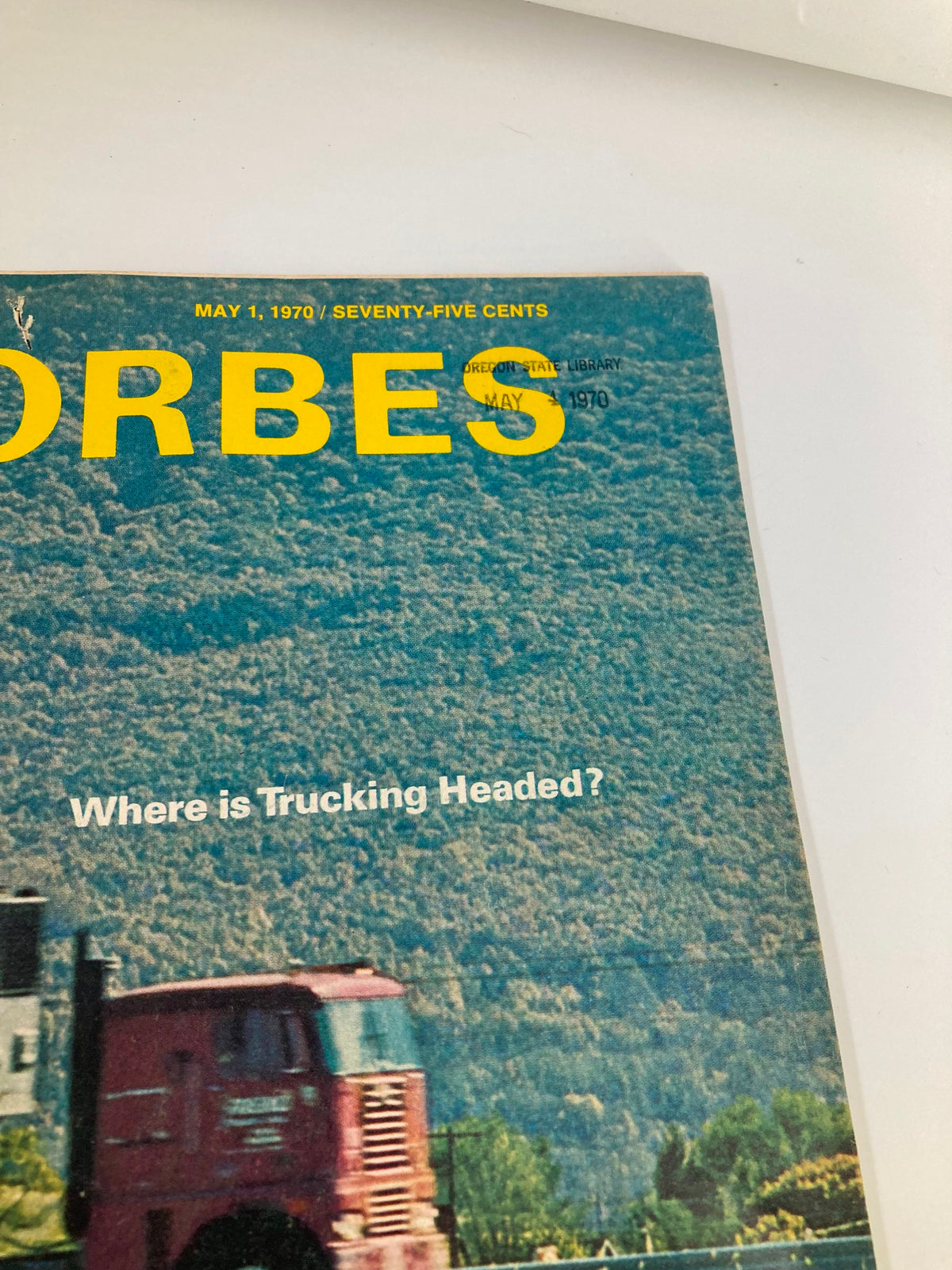 Close-up of the cover of VTG Forbes Magazine May 1, 1970, highlighting the title 'Where is Trucking Headed?' and the date, along with library stamps.