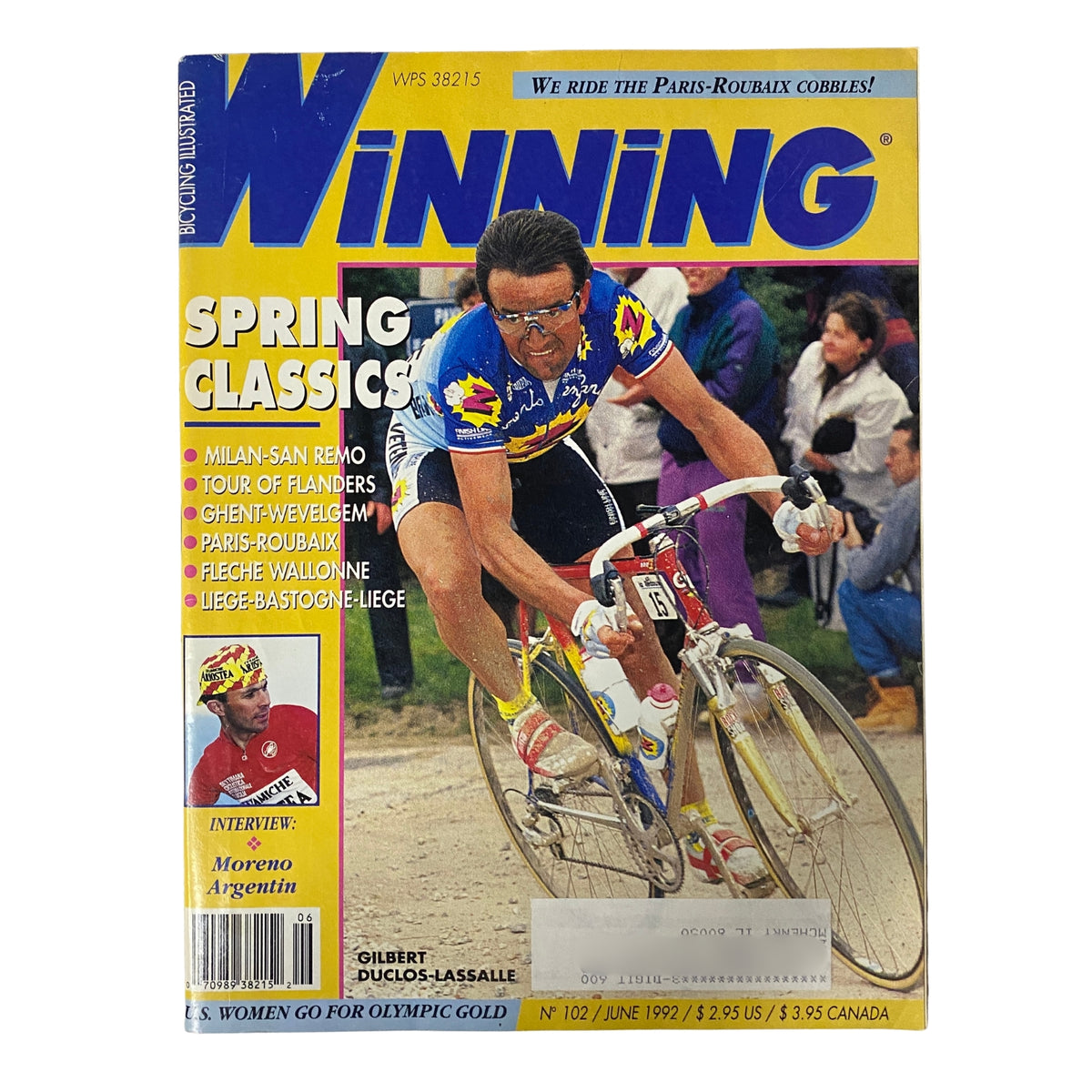 Cover of Winning Bicycle Racing Illustrated, June 1992, featuring Gilbert Duclos-Lassalle in action during the Paris-Roubaix race, highlighting the excitement of the spring classics.