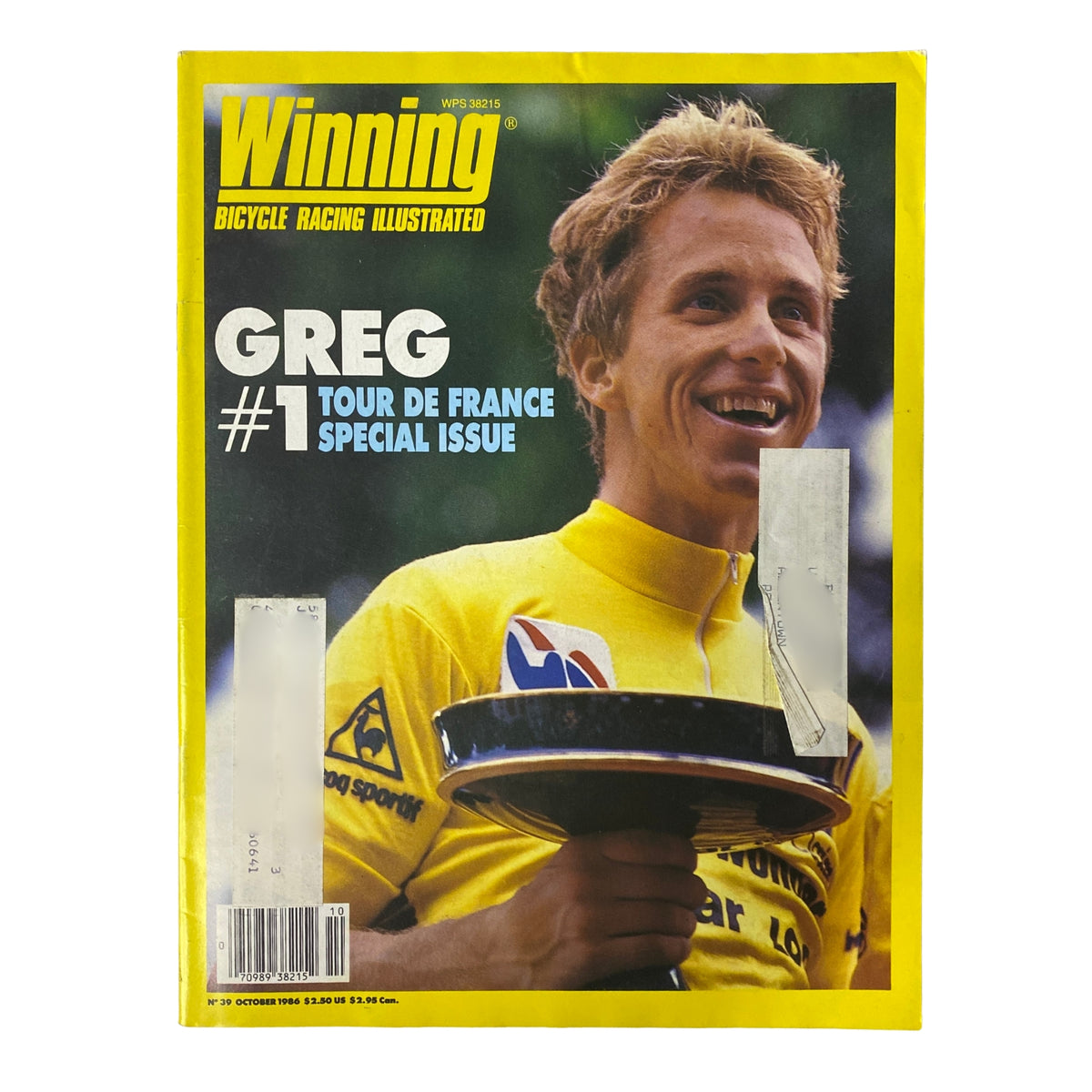 Cover of Winning Bicycle Racing Illustrated, October 1986, featuring Greg LeMond celebrating his Tour de France victory, marked as #1 Tour de France Special Issue, in very good condition.