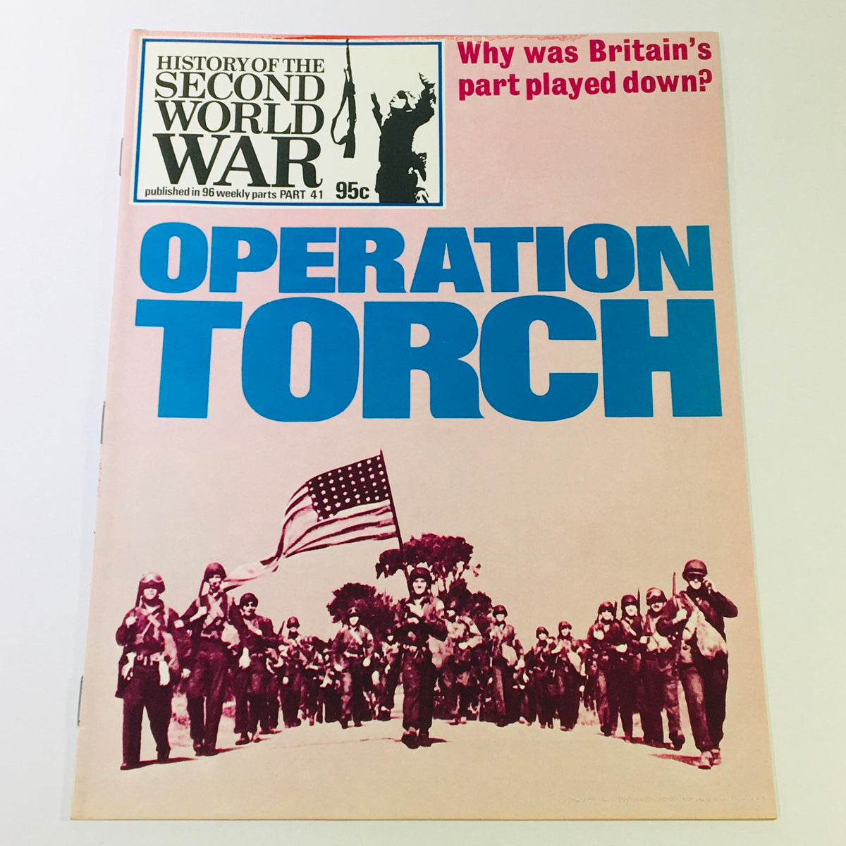 Vintage magazine cover of 'VTG History of the Second World War Part 41 1974 - Afrika Korps Escapes' featuring the title 'Operation Torch' and soldiers marching with an American flag.