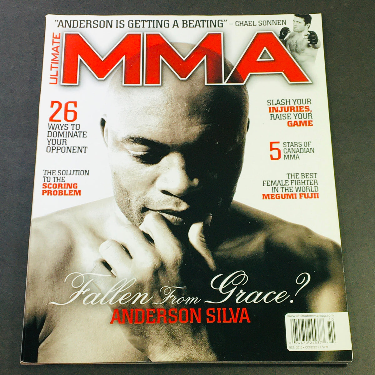 Ultimate MMA Magazine October 2010 cover featuring Anderson Silva, highlighting his intense focus and competitive spirit, accompanied by a quote from Chael Sonnen.
