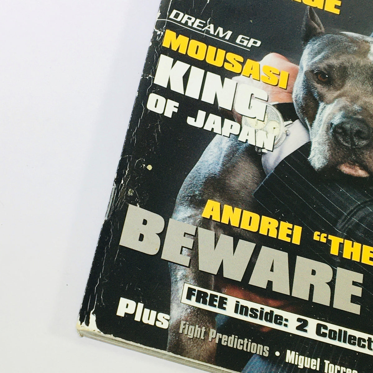 Close-up of Fight Sport Magazine November December 2008 #14 featuring text such as "BEWARE OF THE DOG" and details about Andre "The Pitbull" Arlovski. The image highlights the vintage magazine's condition and collectible nature.