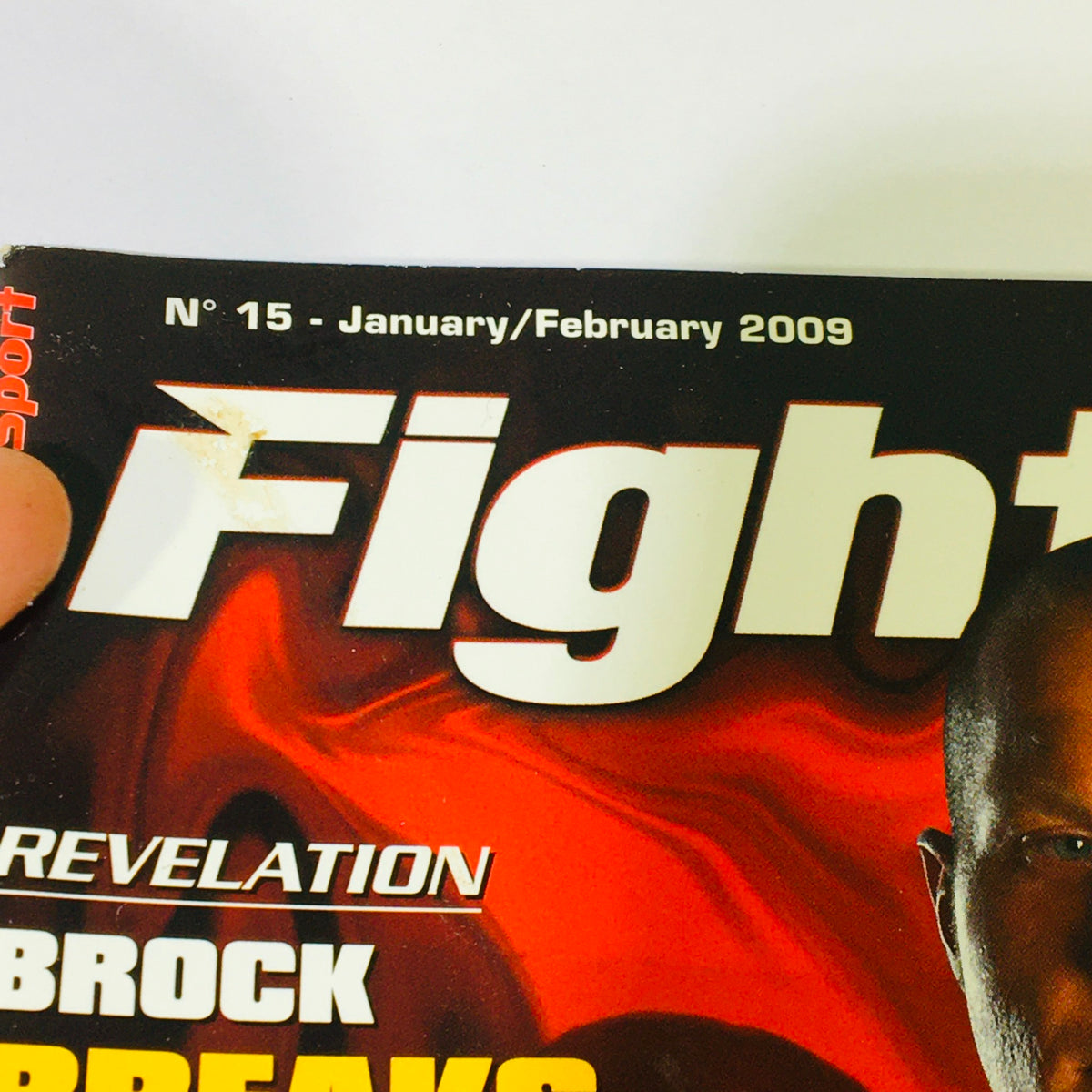 Close-up of Fight Sport Magazine January February 2009 #15 highlighting the title and headlines including 'Brock Breaks Couture' and MMA news.