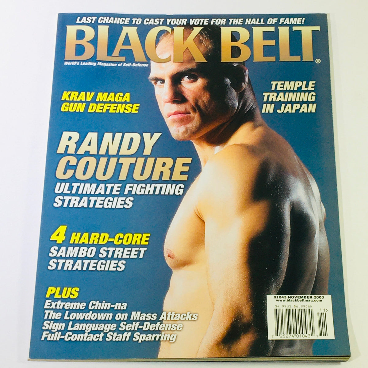 Cover of Black Belt Magazine November 2003 featuring Randy Couture on the front. The magazine highlights Krav Maga Gun Defense, Ultimate Fighting Strategies, and includes content on Sambo Street Strategies and extreme Chin-na techniques.