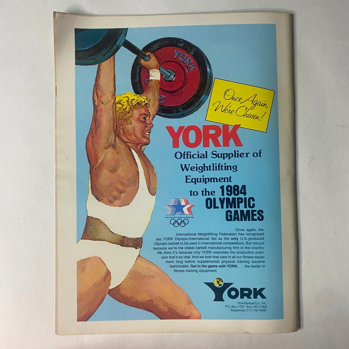 Advertisement from Strength & Health Magazine, September 1984 for YORK weightlifting equipment, promoting its role as an official supplier for the 1984 Olympic Games.