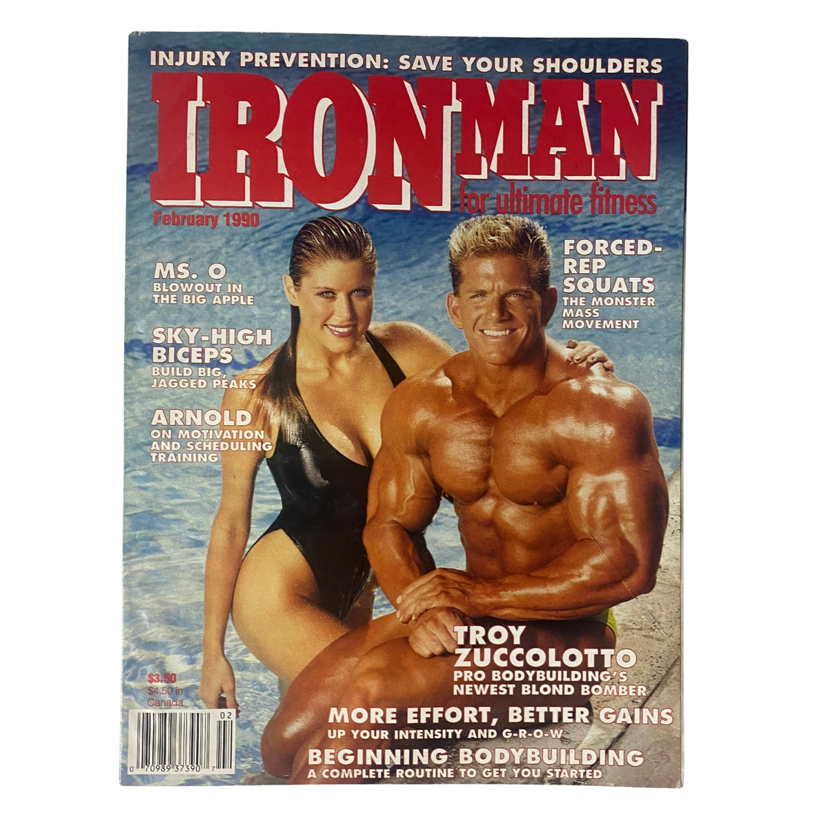 IronMan Magazine February 1990 Vol 49 No. 2 featuring Troy Zuccolotto and Kay Perry on the cover, showcasing bodybuilding aesthetics and fitness tips.