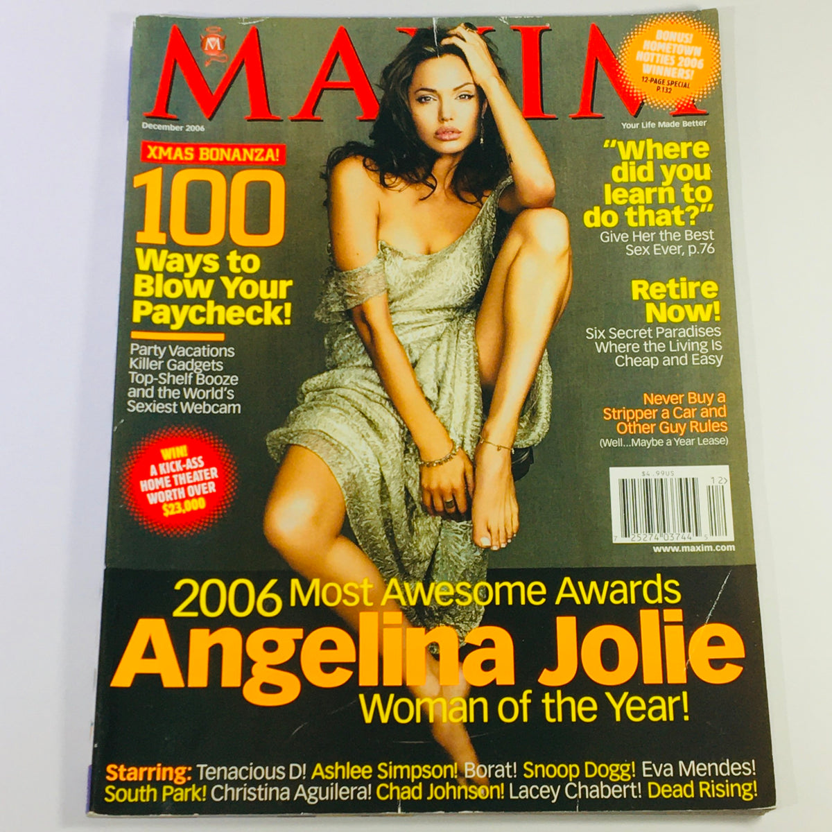 Maxim Magazine December 2006 featuring Angelina Jolie as Woman of the Year on the cover, showcasing vintage pop culture and celebrity influence.