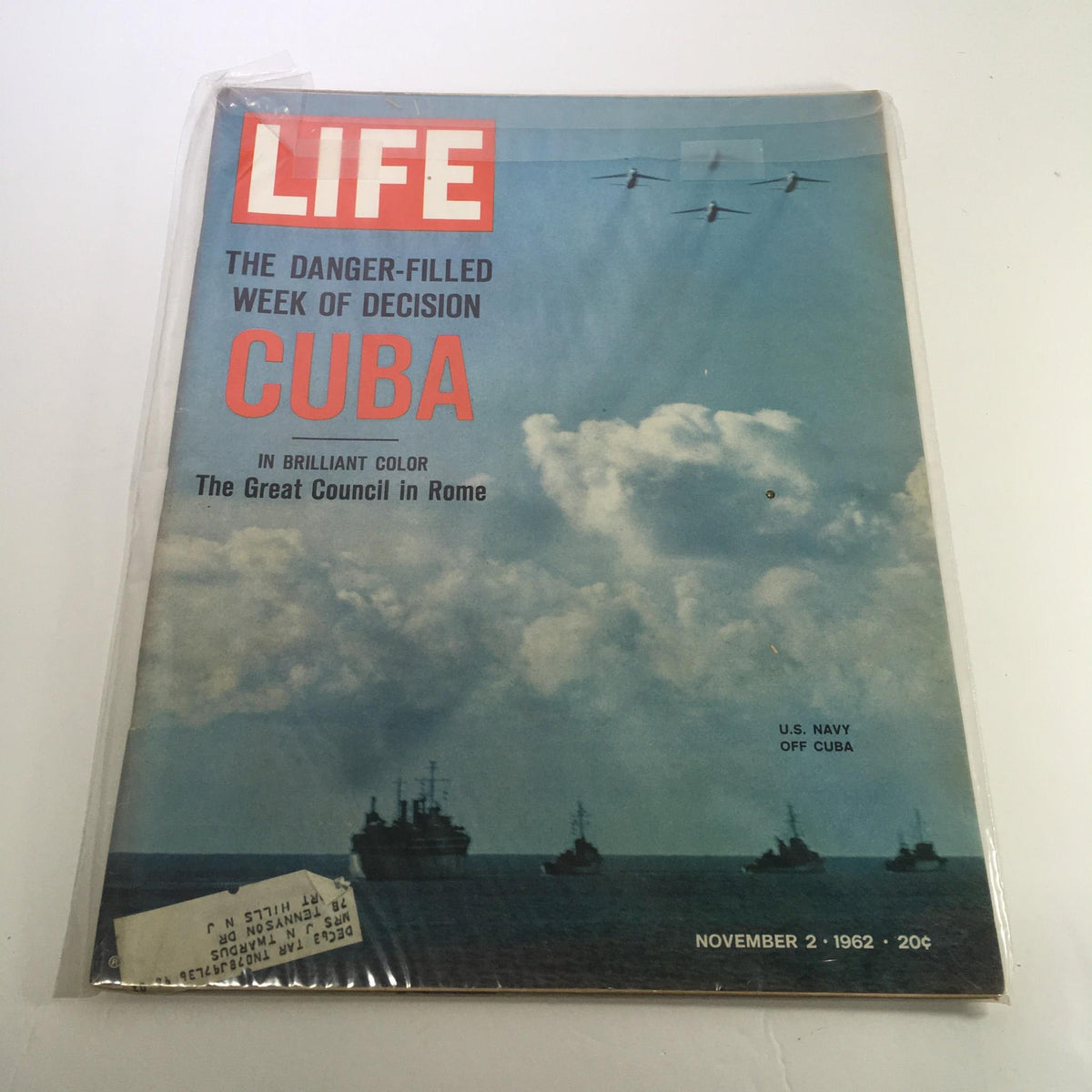 Life Magazine November 2 1962 cover featuring the U.S. Navy off Cuba with bold headlines about the Cuban Missile Crisis and striking color imagery, highlighting a significant historical moment.
