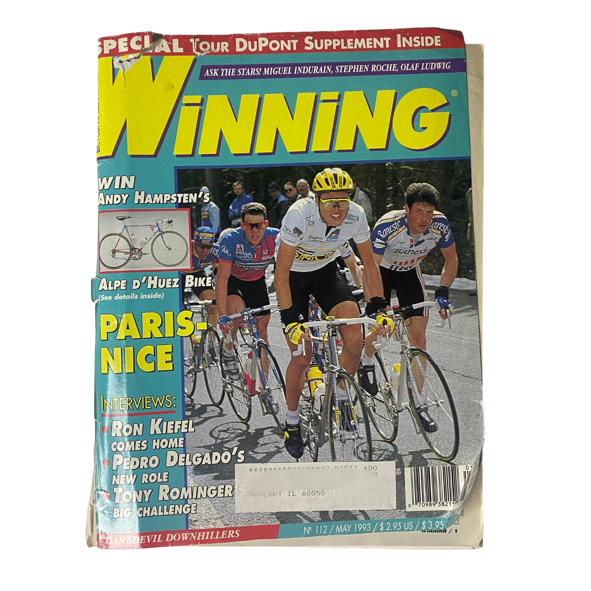 Cover of Winning Bicycle Racing Illustrated May 1993, featuring cyclists in action during Paris-Nice, with Alex Zülle prominently displayed. The magazine explores significant cycling events and interviews profiles like Ron Kiefel and Pedro Delgado.