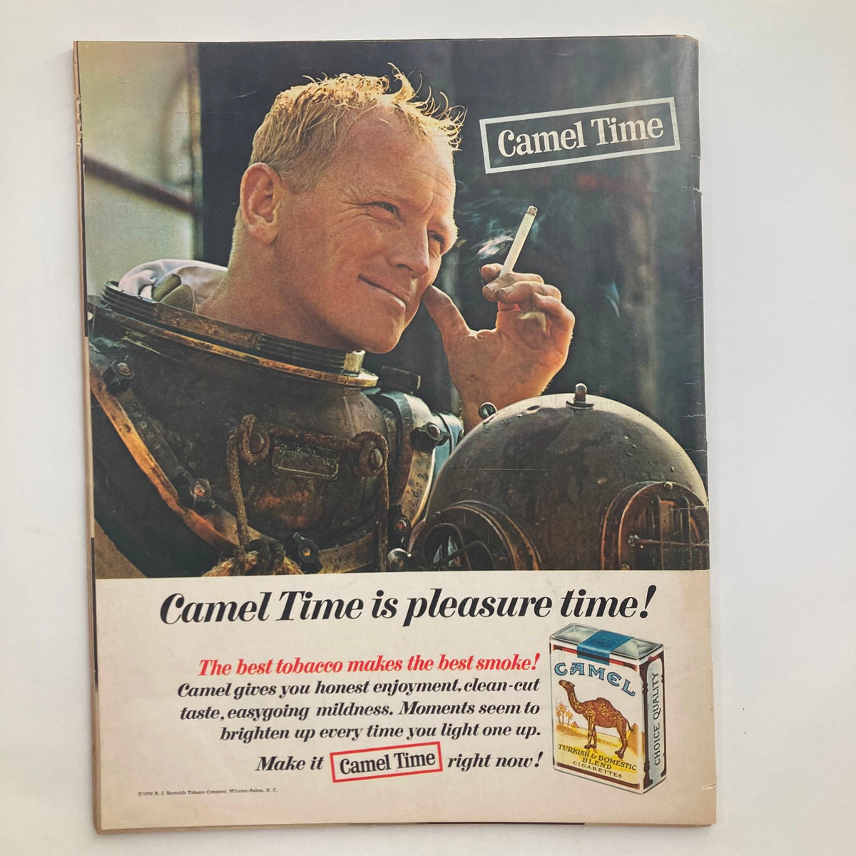 Back cover of RVTG Look Magazine April 21 1964 Vol 28 No. 8 featuring an advertisement for Camel cigarettes with a diver enjoying a smoke.