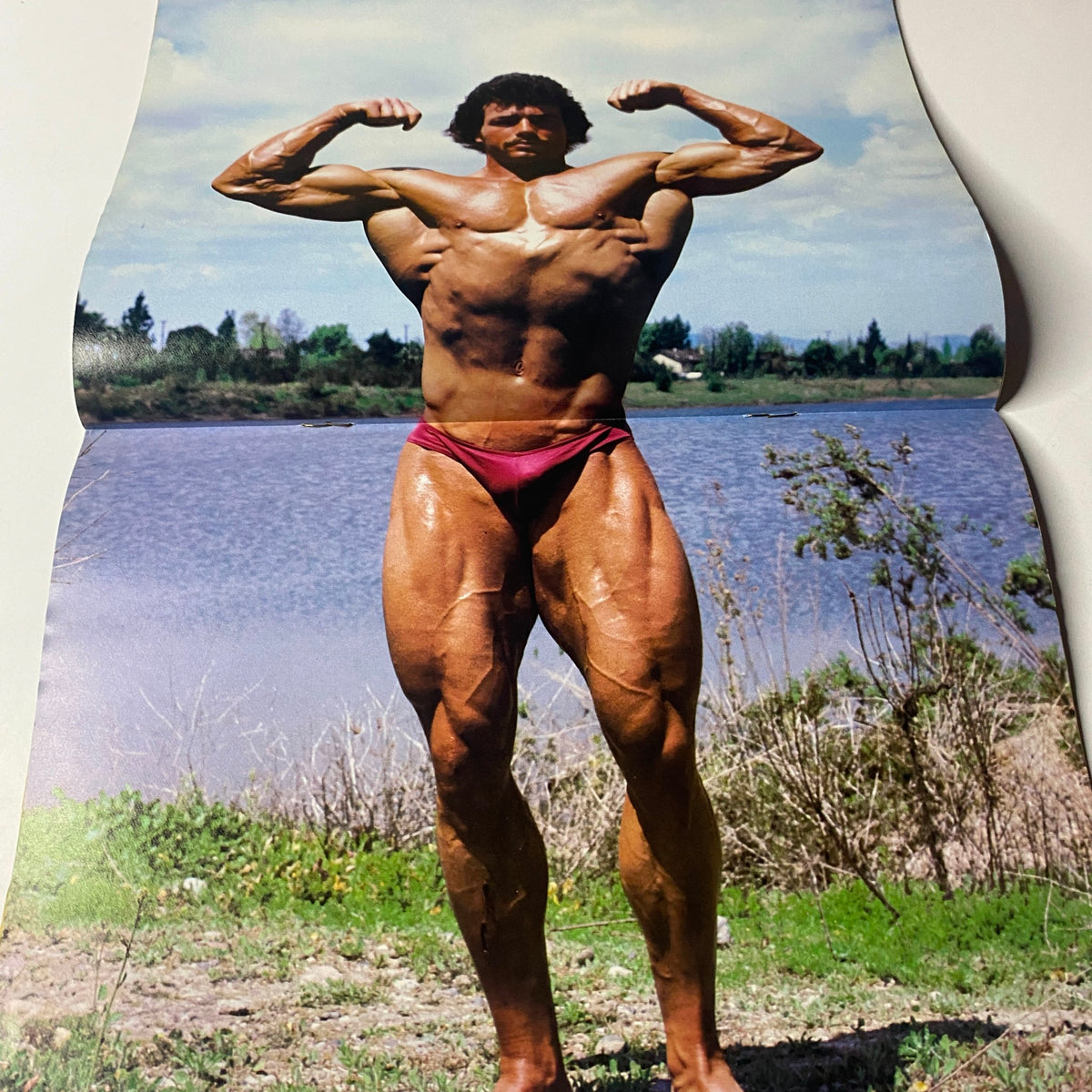 Muscle Digest Magazine August 1982 Vol 6 No. 7 featuring bodybuilder Doug Brignole posing flexibly by a lake with visible musculature and a scenic background.