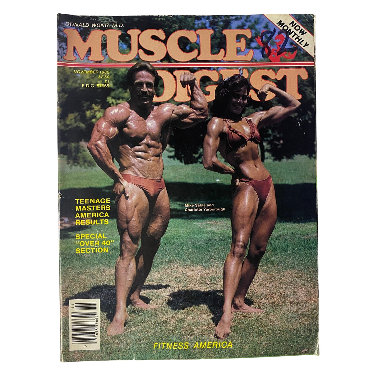 Muscle Digest Magazine November 1982 cover featuring Mike Sable and Charlotte Yarborough showcasing bodybuilding in vibrant poses out in nature.