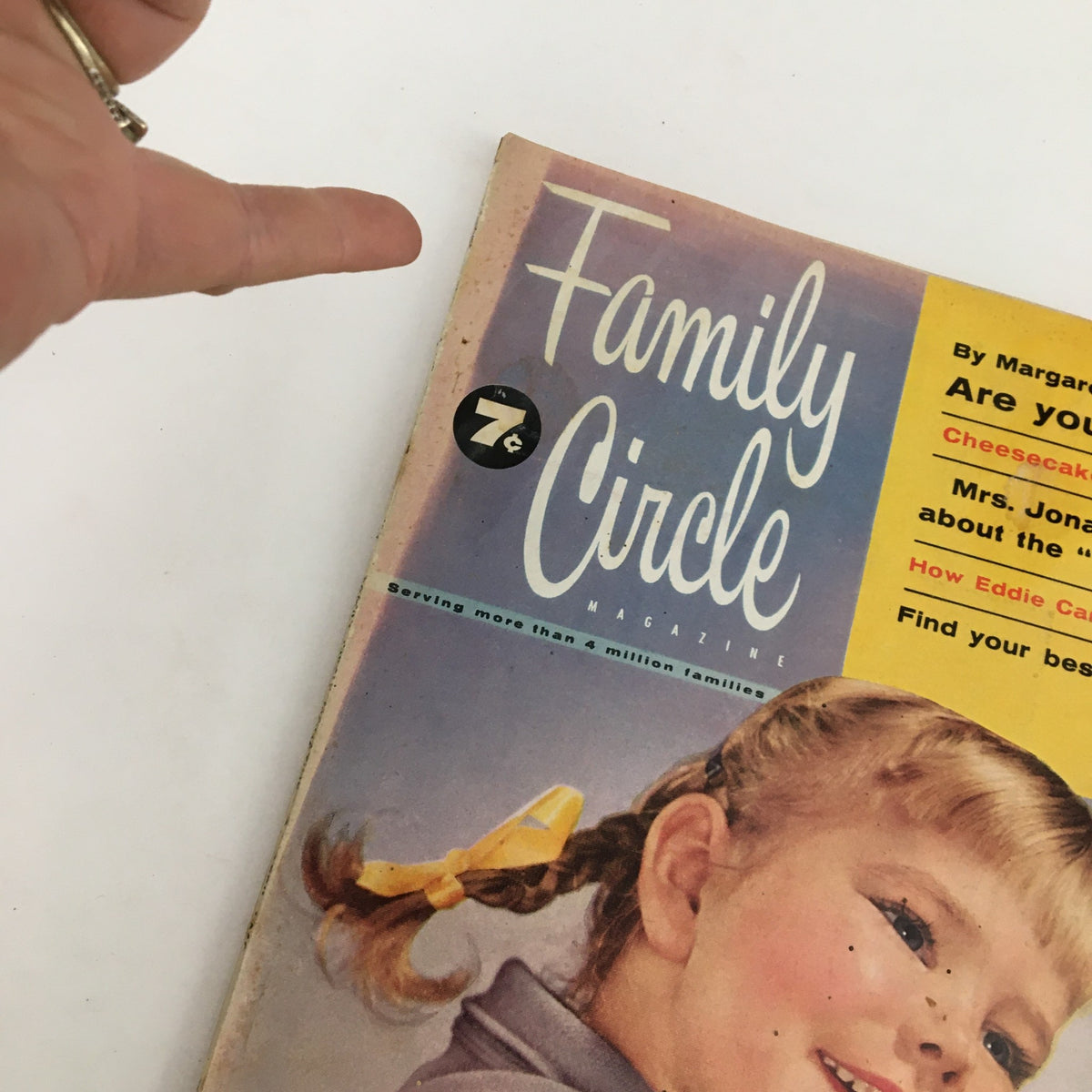Detailed view of the cover of Family Circle Magazine April 1956, showcasing the title and nostalgic vintage design.